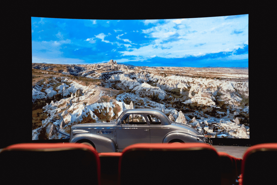 A classic 1939 Cadillac LaSalle is showcased in Savoy's theater with the background provided by a large DVLED display